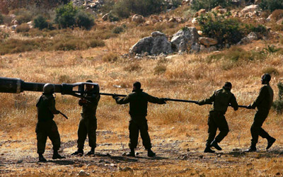 Israel hits Lebanon from air and by land