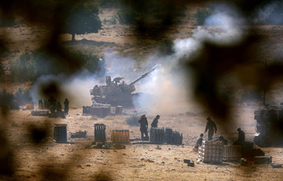 Israel hits Lebanon from air and by land