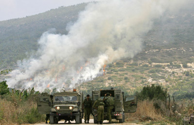 Israel hits Lebanon from air and by land