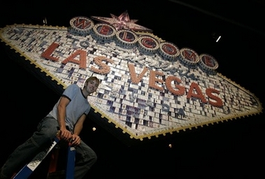 Artist builds Vegas sign with cards, dice