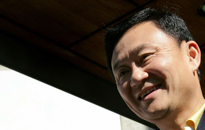 Thaksin wants to return, advised not for now