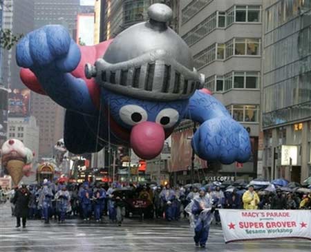 Macy's balloons fly through rain, wind