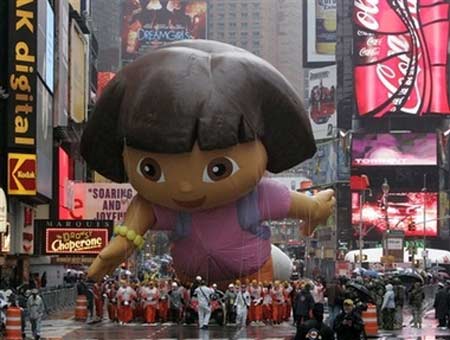 Macy's balloons fly through rain, wind