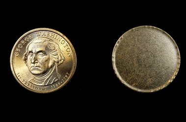 Couple find faceless dollar coin