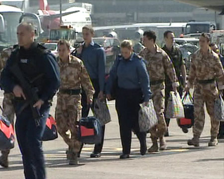 British military personnel arrive home