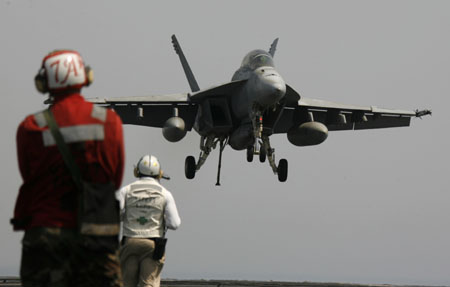 Aircraft carrier reinforces US troops in Iraq