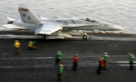 Aircraft carrier reinforces US troops in Iraq
