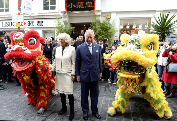 Prince William arrives in China to warm welcome