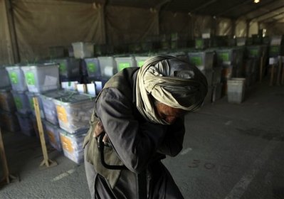 Afghan commission: fraud filings could sway vote