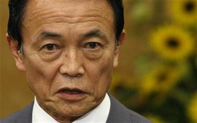 Japan PM Aso dissolves lower house, risks historic defeat