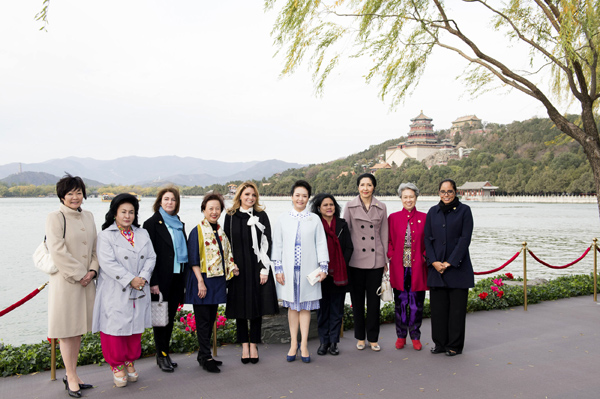 Wives work to boost cultural exchanges among economies