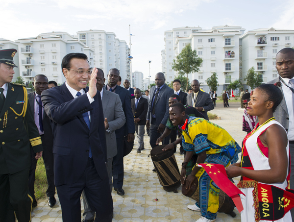 Li vows to protect rights of Chinese working abroad