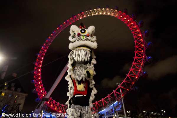 London Eye lit red, gold for Chinese New Year