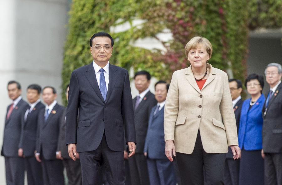 Chinese premier attends welcoming ceremony held by Merkel