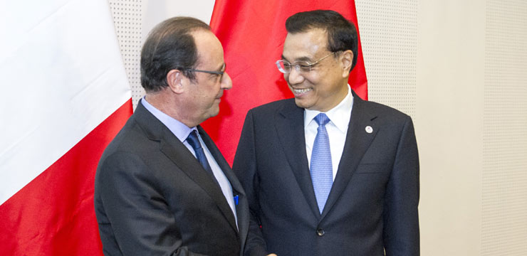 Chinese premier, French president meet on deepening ties