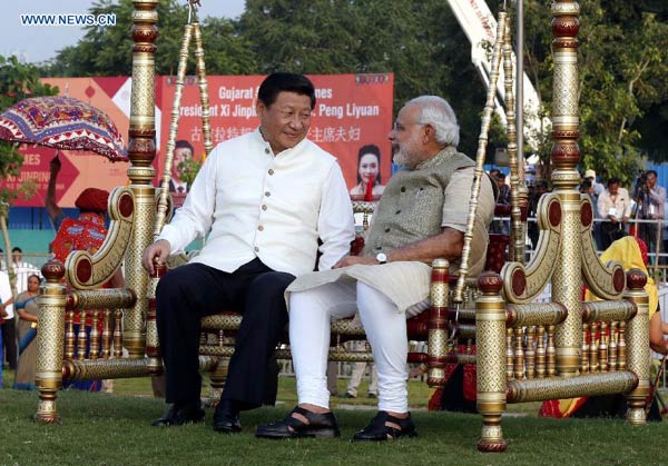 Xi visits Modi's home state, extends birthday wishes