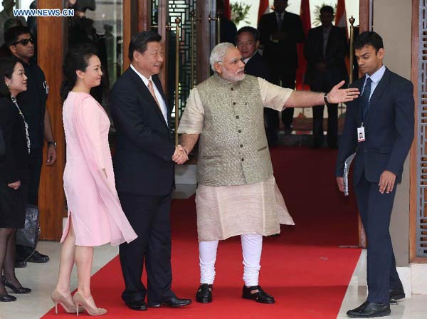 Xi visits Modi's home state, extends birthday wishes