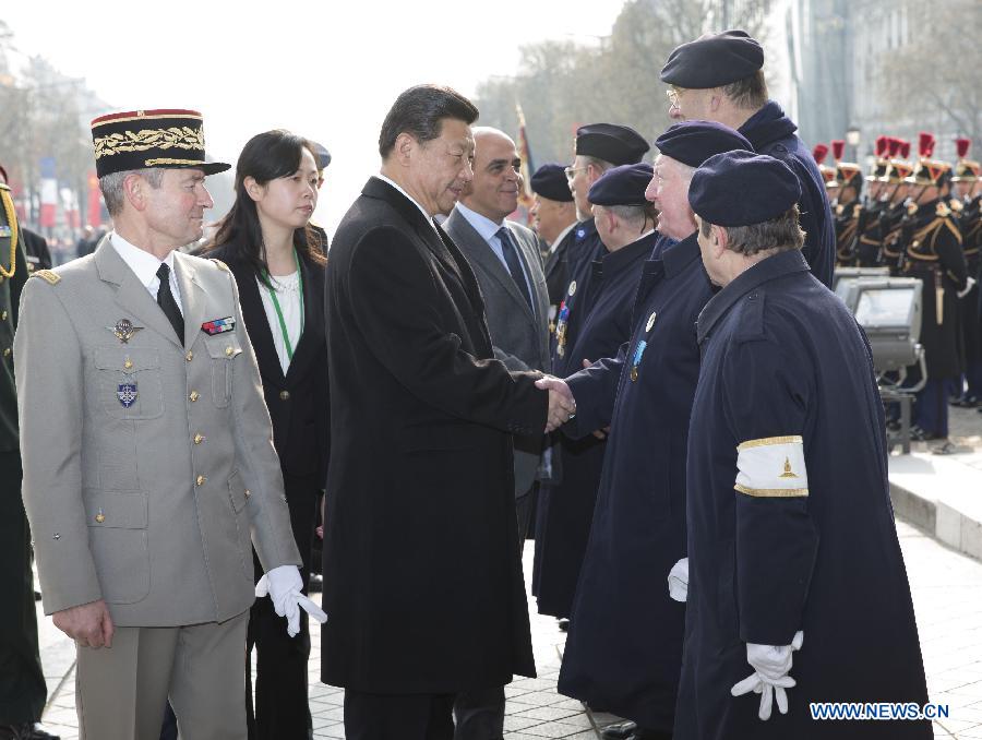 Xi lays wreath of flowers at Tomb of Unknown Soldier in Paris