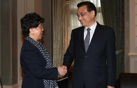 Premier Li meets with WHO director general in Switzerland
