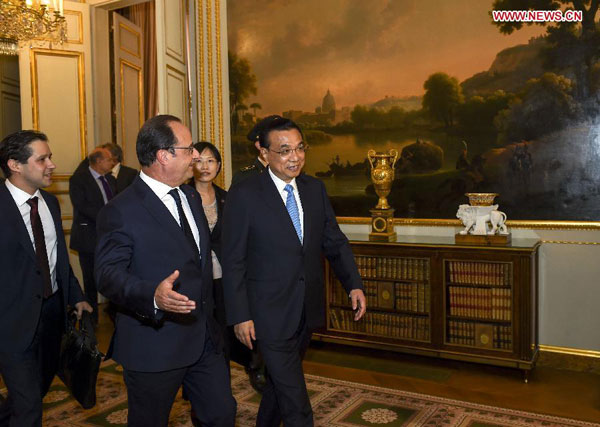 Premier Li meets French president in Paris