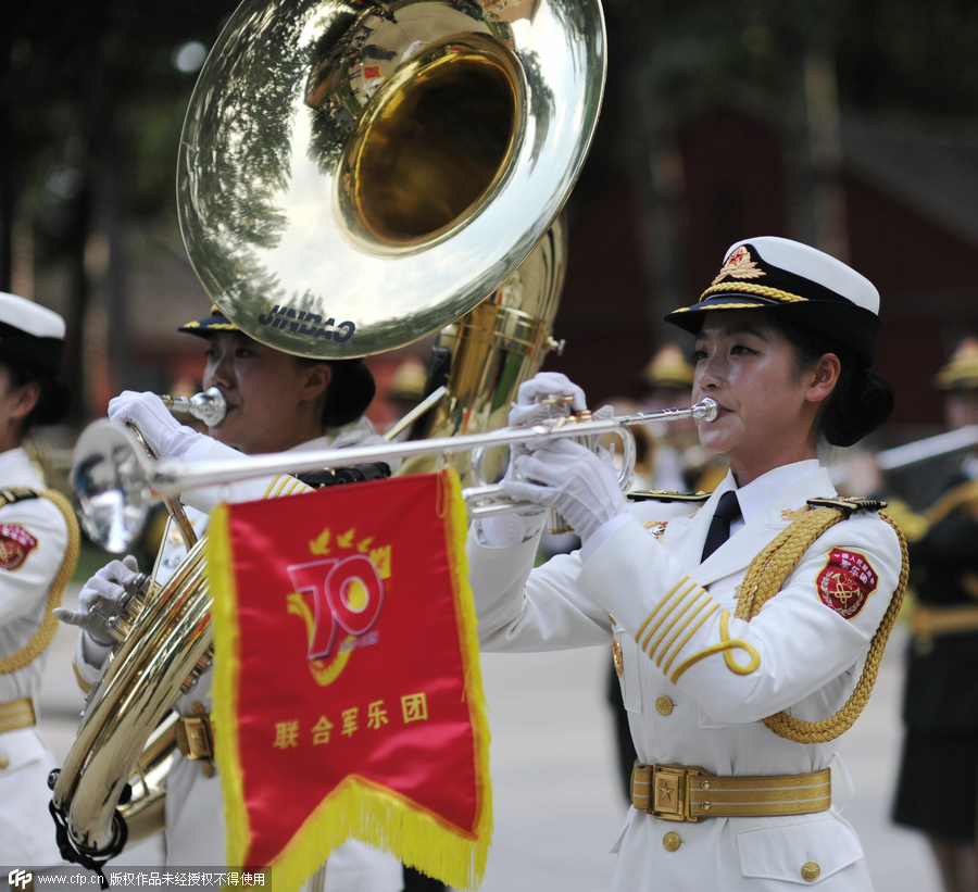 Female soldiers of military band practice for the