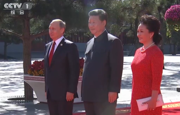 President Xi welcomes guests