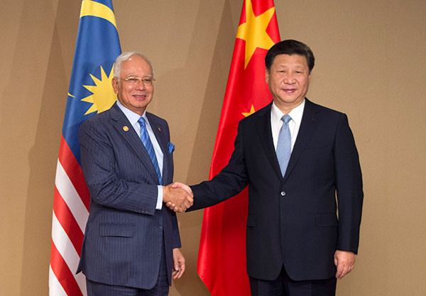 Xi vows to boost Malaysian ties