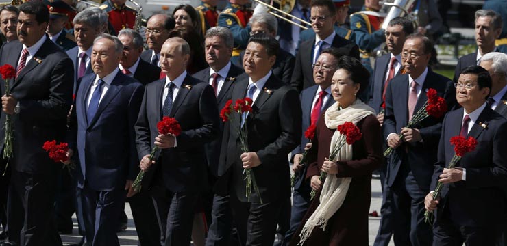 Xi attends Russia's V-Day parade, marking shared victory with Putin