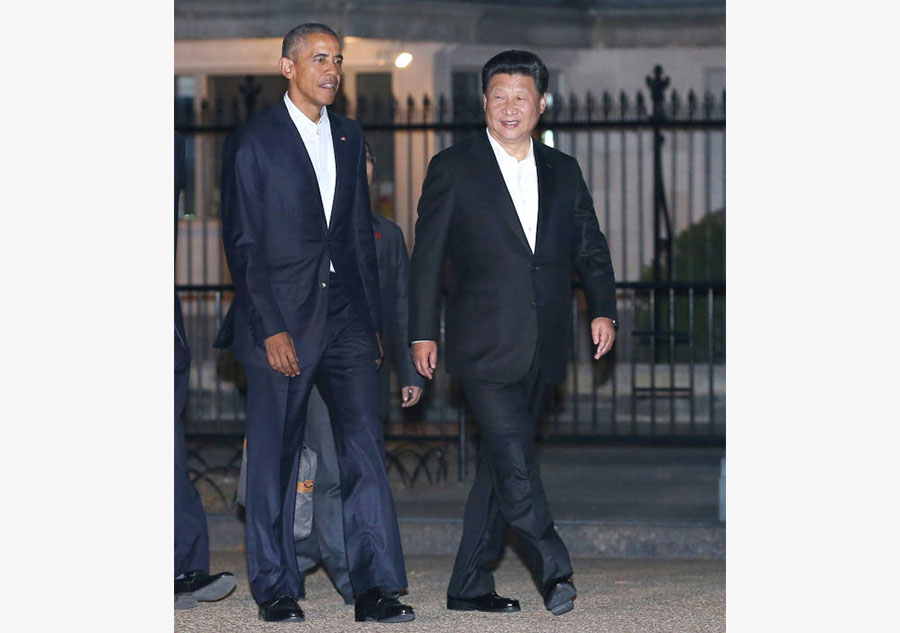 Xi, Obama go tieless to untie various issues at private dinner