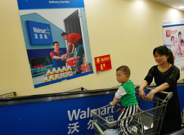 Wal-Mart presses suppliers to share benefits of the yuan