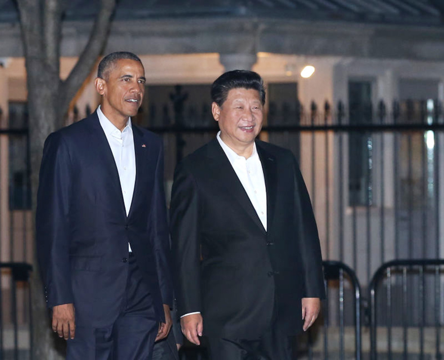 President Xi welcomed by Obama as he arrives in Washington DC