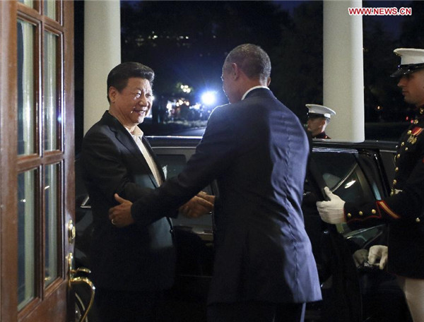 Xi, Obama go tieless to untie various issues at private dinner