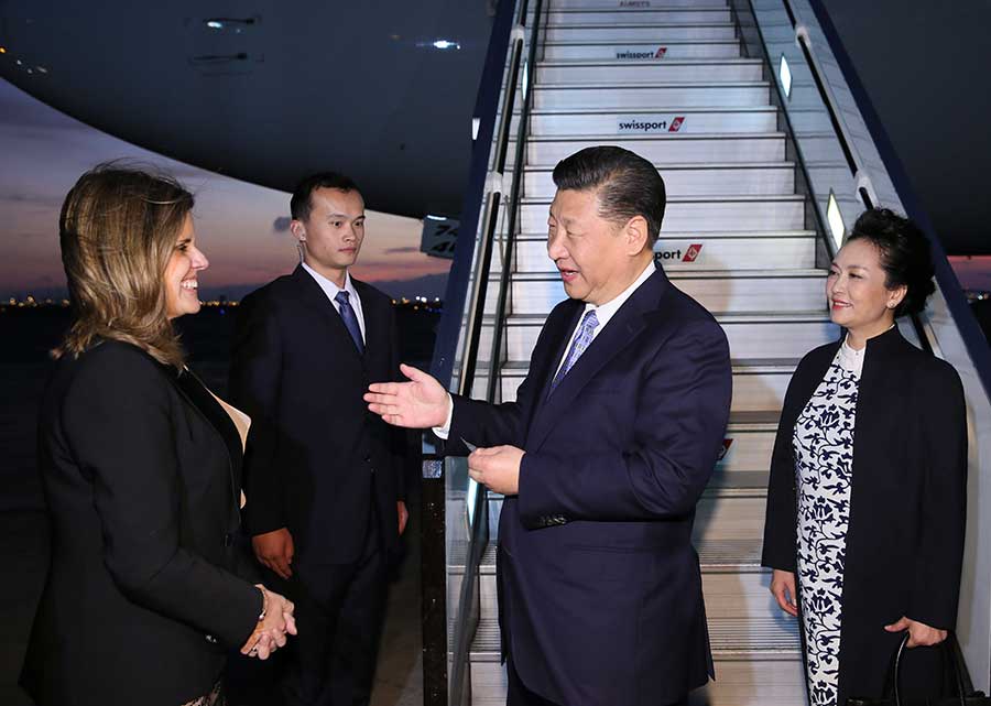 Xi arrives in Peru for APEC meeting, state visit