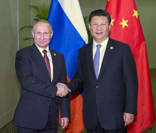 Xi talks trade in Asia-Pacific with Russian President Putin