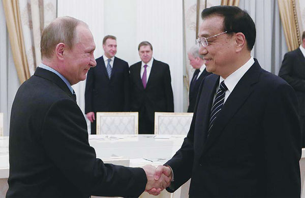 Li, Putin meet in Moscow