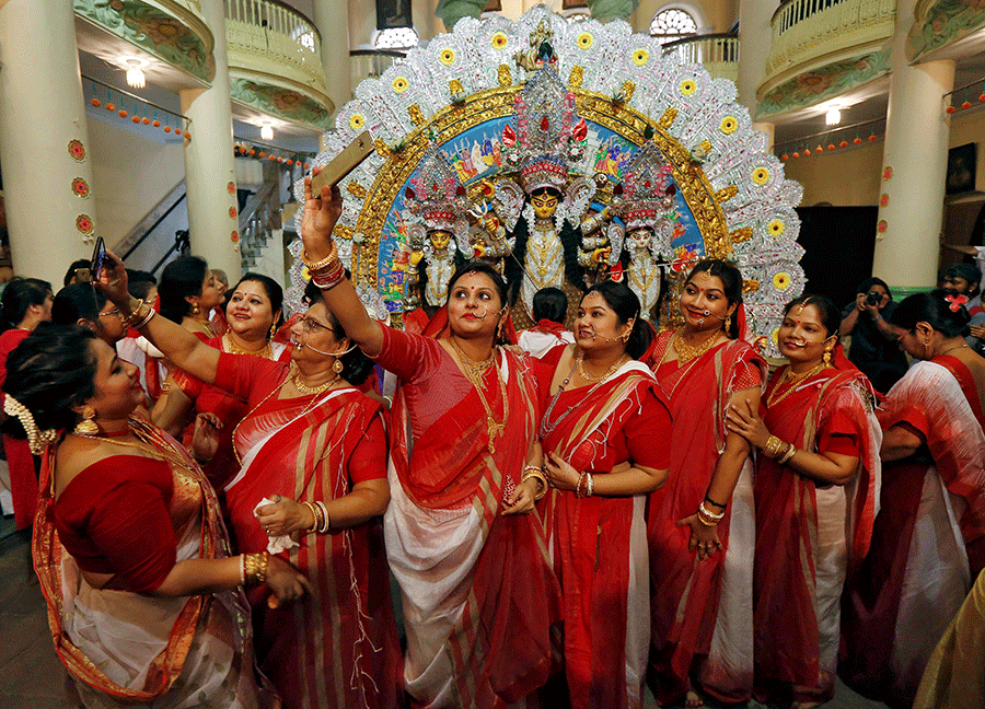 People celebrate Durga Puja in West Bengal, India