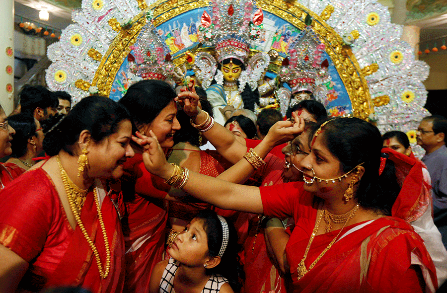 People celebrate Durga Puja in West Bengal, India