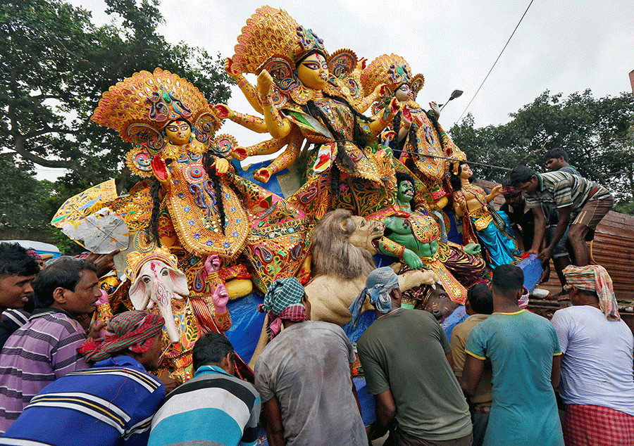 People celebrate Durga Puja in West Bengal, India