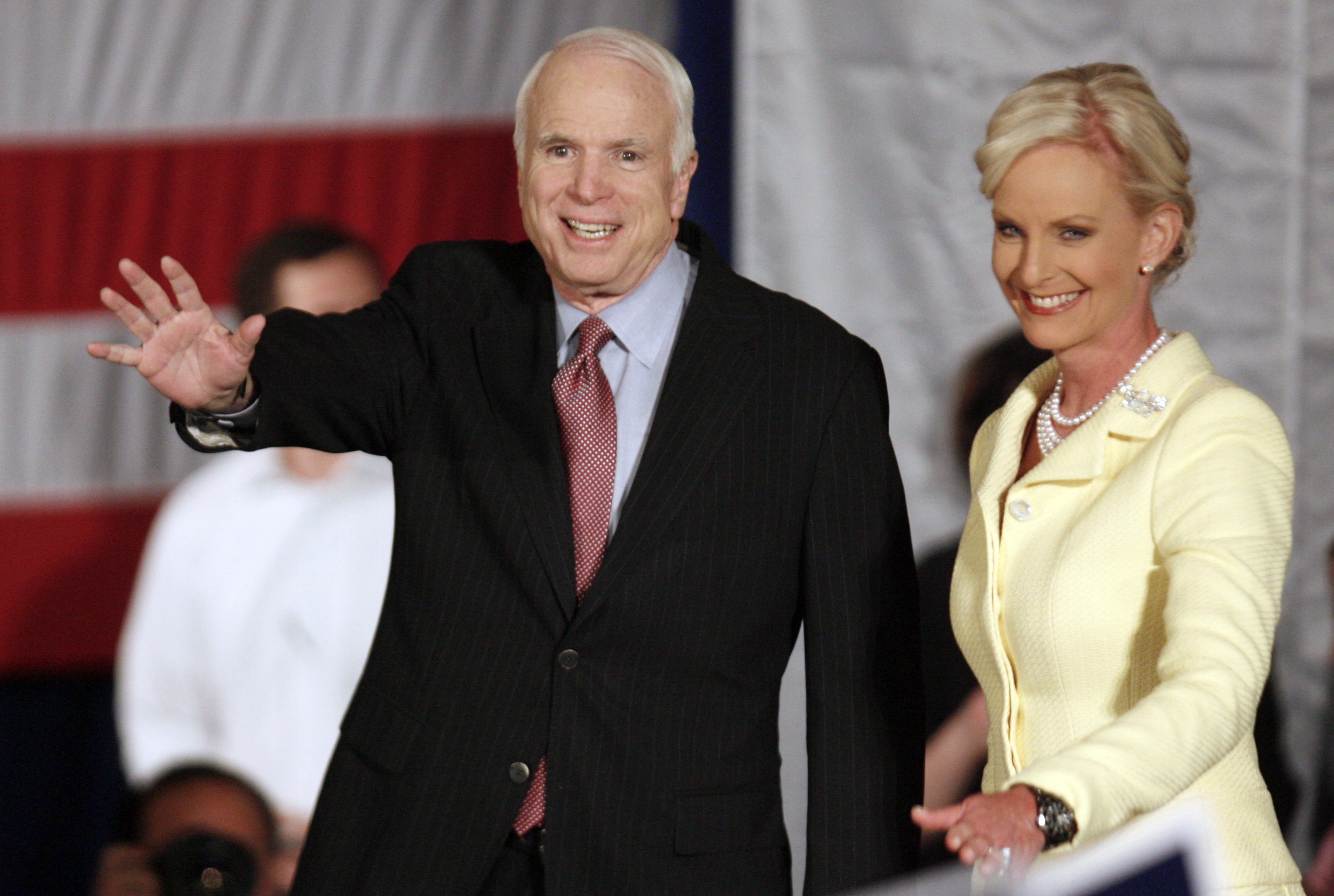 McCain clinches GOP nod; Clinton wins RI