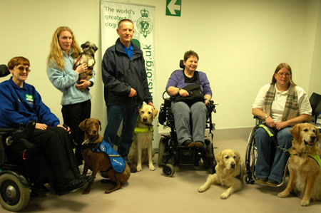 The disabled rest with their dogs at the 117th Crufts dog show in Birmingham, central England, March 7, 2008.