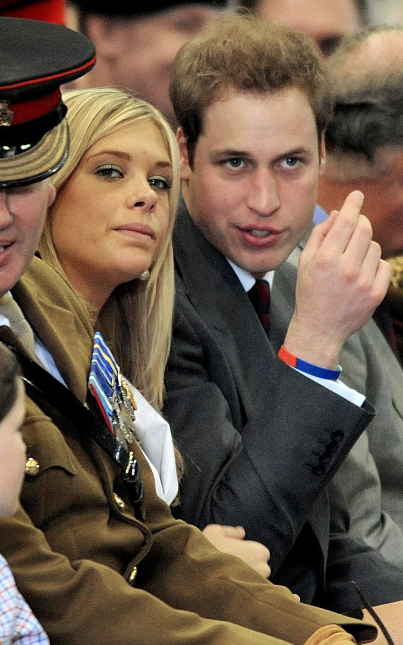 britain s prince william sits with chelsy davy l as his brother prince ...