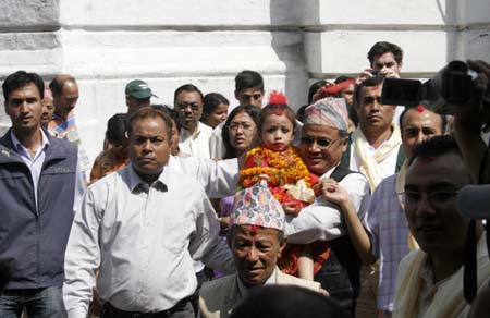 The new Living Goddess Kumari arrives at Kumari Gahar in Kathmandu, Nepal, Oct. 7, 2008. Three-year-old Matina Shakya took her seat as the Living Goddess at Kumari Ghar on Tuesday. (Xinhua/Bimal Gautam)