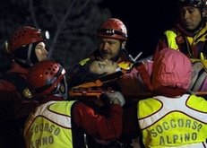 Italian rescuers hunt survivors as quake kills 179