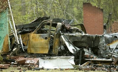 Official: Ala. man kills wife, 3 others, self