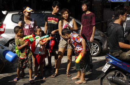 People enjoy water fun amid emergency state in Bangkok