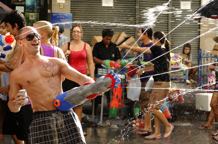 People enjoy water fun amid emergency state in Bangkok