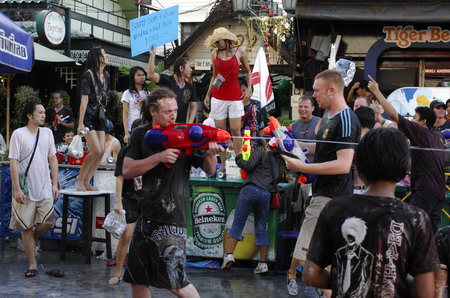 People enjoy water fun amid emergency state in Bangkok