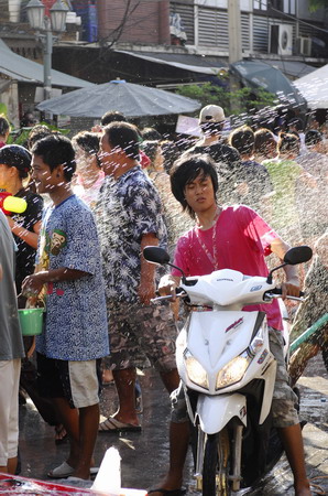 People enjoy water fun amid emergency state in Bangkok