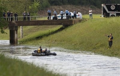 Officials: 5 Houston children dead in swamped car