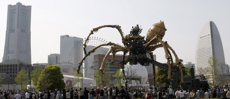 Giant mechanical spiders turn out for celebration